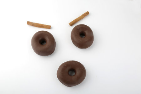 chocolate donuts as a happy faceの写真素材