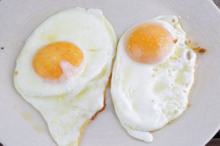 fresh fried eggs for breakfastの写真素材