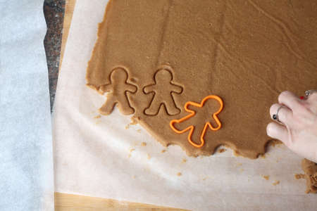 baking homemade christmas ginger cookiesの写真素材