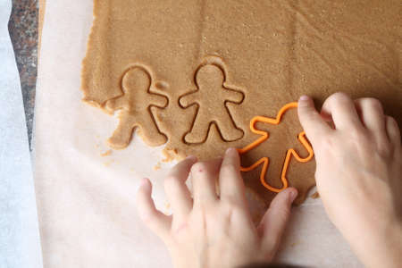 baking homemade christmas ginger cookiesの写真素材