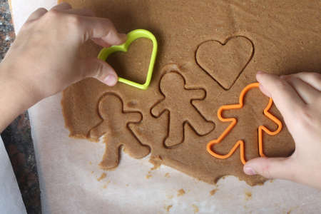 baking homemade christmas ginger cookiesの写真素材