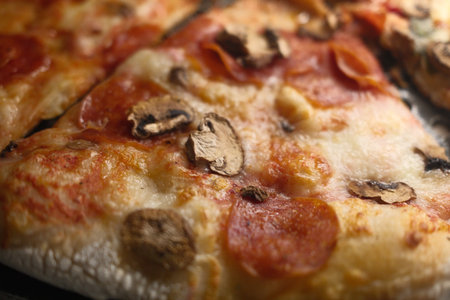 Pizza with mozzarella cheese and mushrooms, closeup viewの写真素材