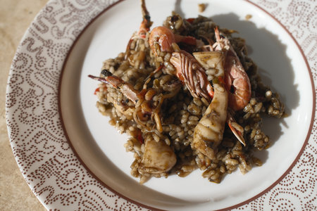 Paella with seafood, closeup of a traditional spanish dish
