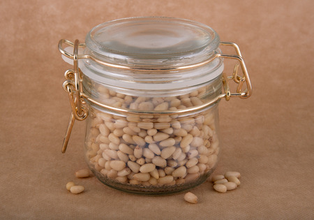 Glass jar of cedar nutsの写真素材