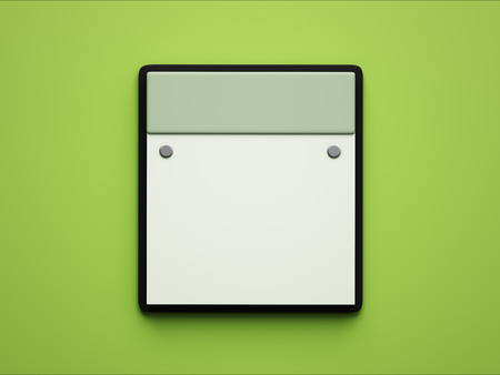 Blank White Paper Notepad isolated on green backgroundの写真素材