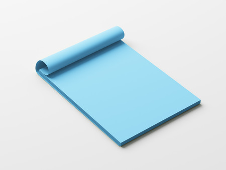 Blank Blue Paper Notepad isolated on white backgroundの写真素材