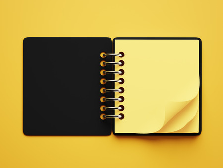 Blank Yellow Paper Notepad isolated on yellow backgroundの写真素材