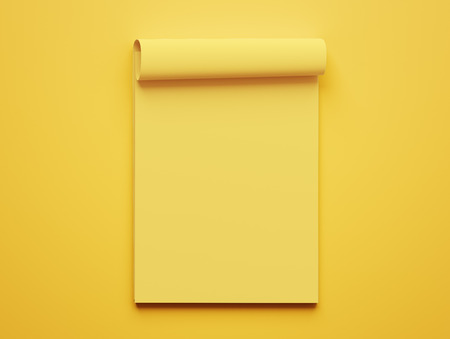 Blank Yellow Paper Notepad isolated on yellow backgroundの写真素材