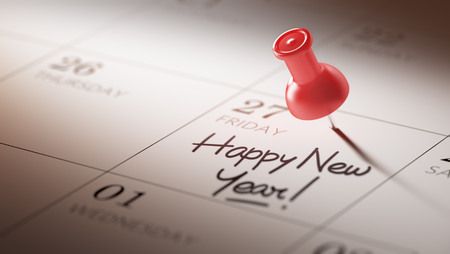 Concept image of a Calendar with a red push pin. Closeup shot of a thumbtack attached. The words Happy New Year written on a white notebook to remind you an important appointment.の写真素材