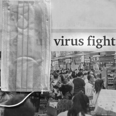 Newspaper headlines related of coronavirus crisis circumstance on some local newspaperの写真素材