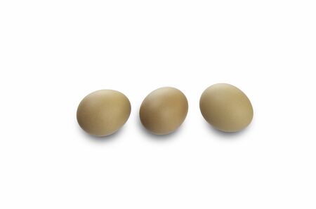 three eggs isolated on white backgroundの写真素材