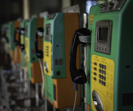 old model public telephon has been implementation inside the building for communication serviceの写真素材