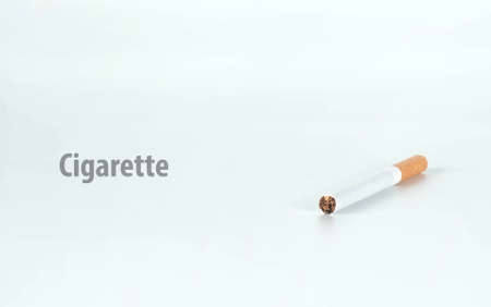 one cigarette isolated on white backgroundの写真素材