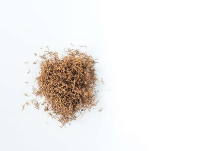 heap of tobacco isolated on white background from overhead view with copy space.の写真素材