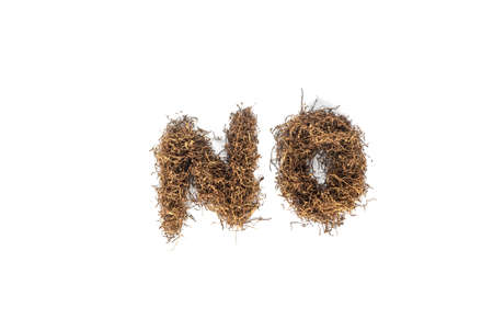 pile of tobacco arrange as "no" message isolated on white background from top view with copy space.concept for world tobecco, quit smoking , against narcotic.の写真素材