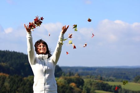 Beautiful happy smiling autumn girlの写真素材