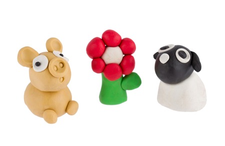 Sheep and pig made of plasticineの写真素材