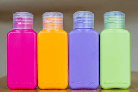 Small colored plastic bottles for traveling