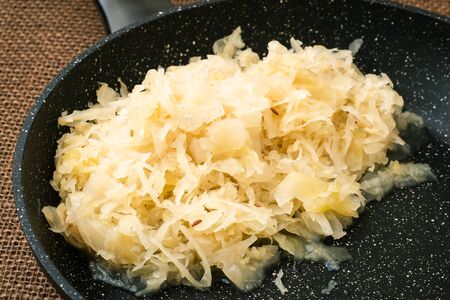 Fresh healthy sauerkraut in a frying panの写真素材