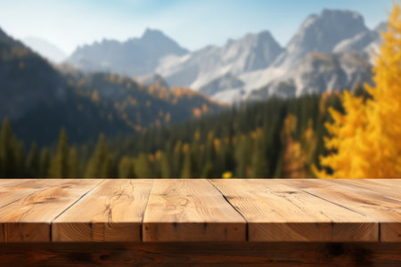 Wooden table top on blurred background of autumn color landscape in dolomites - for displaying your productsの素材