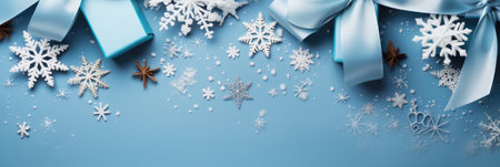 Merry Christmas and Happy Holidays greeting card, banner. Snowflakes and Christmas gifts on a blue backgroundの素材
