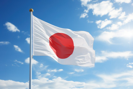 Japanese flag flying on a flagpoleの素材