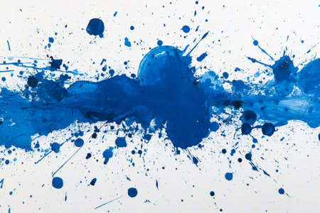 Vivid blue paint splatters dynamically across a pristine white canvas, forming an abstract expression of color and motionの素材