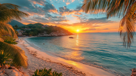 Tranquil tropical beach bathed in golden sunset light, with palm trees framing the breathtaking ocean viewの素材