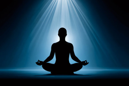 Person finds inner peace through yoga and meditation under light beams, promoting mindfulness and spiritual well-beingの素材