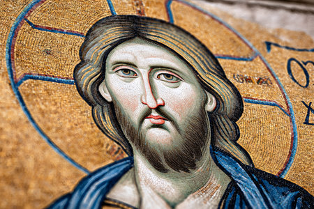 Jesus Christ mosaic displaying Byzantine art and religious devotion in a historical architectural iconの素材