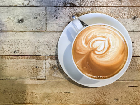 A cup of latte with beautiful latte artの写真素材