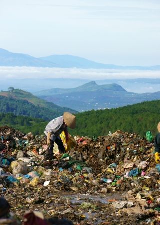 Many people make their live by pick up waste, someone pick up along street, these people concentrate at rubbish dump, they work all day here  Viet Nam- September 05, 2013のeditorial素材
