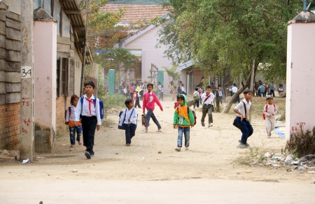 KHANH HOA, VIET NAM- FEBRUARY 5: Chidren has just school is out at countryside, they jump around out school, Khanh Hoa, Viet Nam, February 5, 2013のeditorial素材