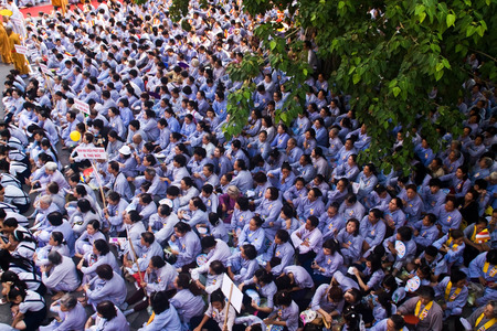 HO CHI MINH CITY, VIETNAM- MAY 5  Impression overview with overcrowded of buddhist in grey dress uniform, sitting on yard of Pagoda on anniversary of buddhaのeditorial素材