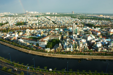HO CHI MINH ,VIETNAM- AUG 7  Impression panaromic of Vietnamese city on day, group of house along Tau hu canal, amazing, abstract Asia panaromic from high view make colorful scene, Viet Nam,Aug 7,2014のeditorial素材