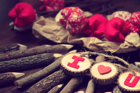 Valentine background, amazing vintage style, handmade flower, I love you message on wooden,  purple pink and red color, Valentine day is the day for couple, they give lovely gift for loverの写真素材