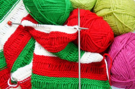 Knit with ball of wool, handmade present for lover with heart, material are colorful wool, needle with clever of hand can make meaningful gift and pleasure lifeの写真素材