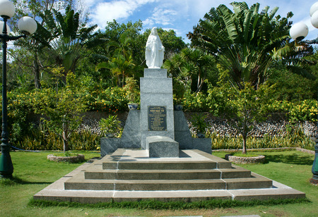 Han Mac Tu, a fomous Vietnamese poet, short life artist, his grave at Genh Rang tourist area, Quy Nhon, Binh Binh, Viet Nam, poem in calligraphy on wooden background, stone hill, beauty natureのeditorial素材