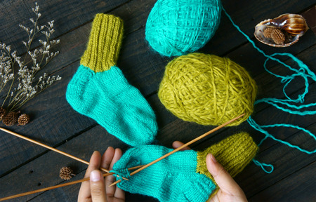 Pair of socks for winter season, knit from vibrant woollen for kid, keep foot in warm on cold day,...