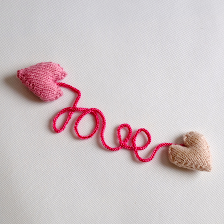 Amazing valentine background in pink colour, symbol of heart, i love you message, rose flower, all gift make handmade, knit from yarn, Valentines day on feb 14 is romantic day for loveの写真素材