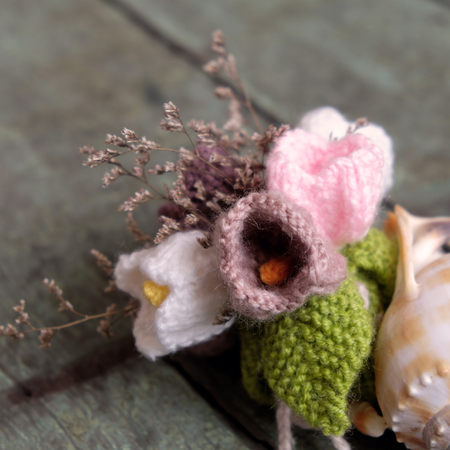 Love background, handmade flower make from yarn, knitted love, meaningful for valentines day or mother day, amazing diy for holidayの写真素材