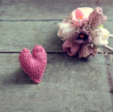 Love background, handmade flower make from yarn, knitted love, meaningful for valentines day or mother day, amazing diy for holidayの写真素材