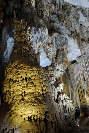 Paradise cave, an amazing, wonderful cavern at Bo Trach, Quang Binh, Vietnam, underground beautiful place for travel, heritage national with impression formation, abstract shape from stalactiteの写真素材