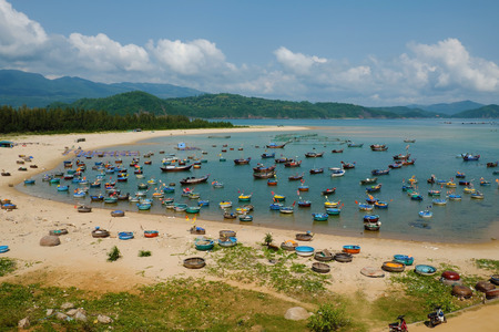 Amazing scene at fishing village in Phu Yen, Viet Nam, crowded of circle boat floating on water, valley of fishing boat at Vietnam channel, group of coracle in panoramic view, beautiful seascapeのeditorial素材