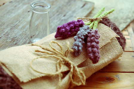 Handmade gift for mother day or valentine day, knitted lavender flower and present box in burlap, beauty lavender bouquet make from knit in free timeの写真素材