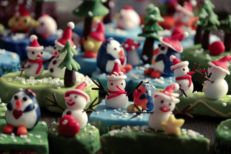 Merry Christmas background and happy new year from abstract handmade art, snowman, owl, bird, christmas tree diy from clay material, wonderful craft to make Xmas ornament for decor in winter holidayの写真素材