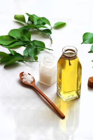 Homemade natural herbal oral care product from  lemon leaves and salt boil with water make yellow mouthwash for dental hygiene, treatment bacteria in oral cavity, make fresh breathの写真素材