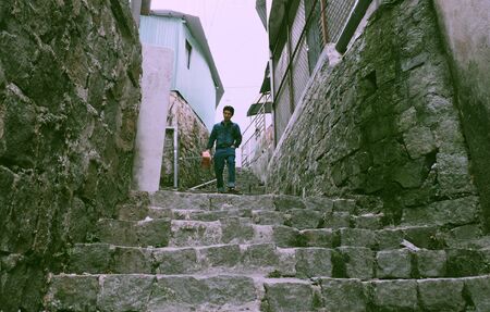 Amazing pathway from stone steps so ancient at Song Lo uphill, Da Lat, Viet Nam, impression walkway...