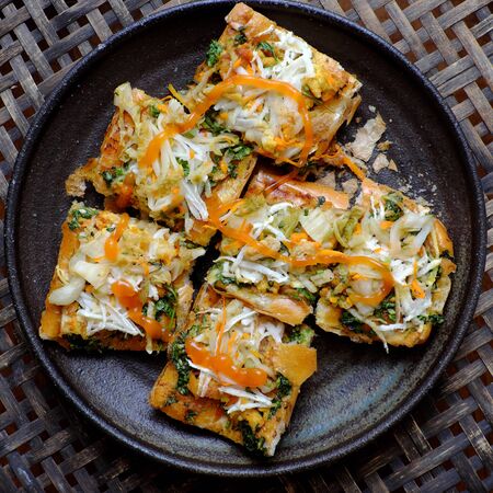 Delicious vegan food ready to eat for breakfast, plate of slice toasted bread, Vietnamese vegetarian...