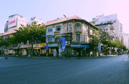 HO CHI MINH CITY, VIET NAM- APRIL 4, 2020: Deserted street, silent scene at central area of big city by request limit move around in pandemic, only few vehicle moving on dayのeditorial素材